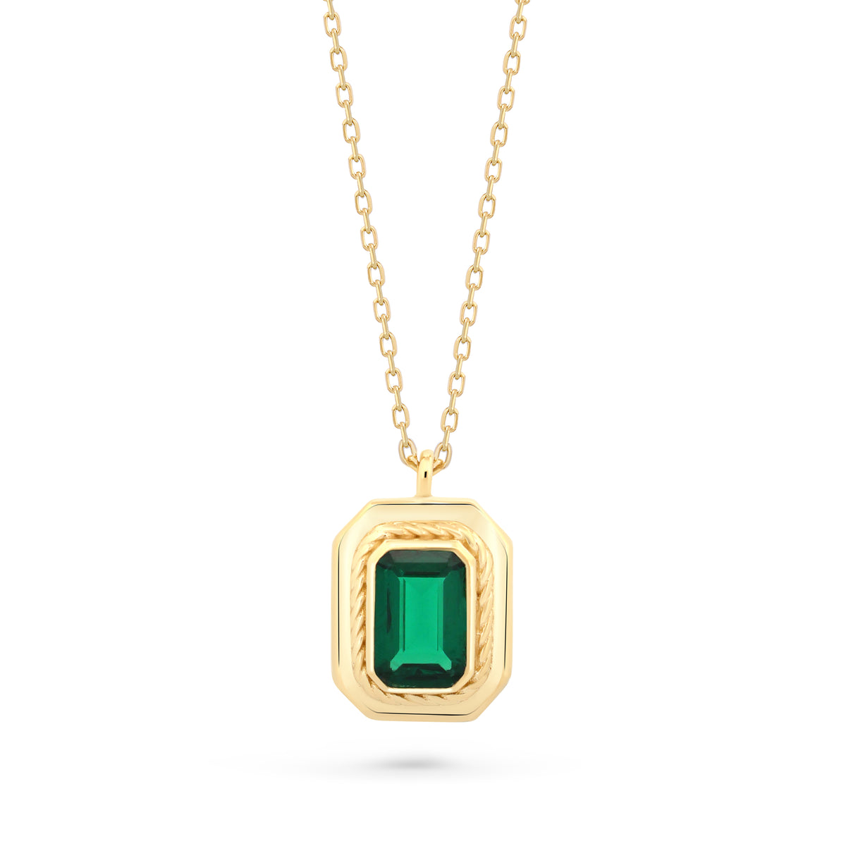 Colier regal din aur 14K cu pandantiv oval decorat cu piatra verde smarald si detalii aurii elaborate inspirate de eleganta vintage. Lant fin inclus