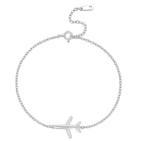 Brățară subțire din argint placat cu rodiu, cu un mic avion decorat cu zirconii, lanț fin de 1 mm, lungime 16+3 cm.