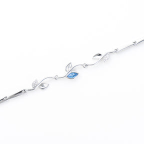 Delicate Blue Flower Bracelet, 925 sterling silver bratara Brățară elegantă din argint 925 placat cu rodiu, cu pietre zirconia albastre – bijuterie fină Maison La Stéphanie, ideală pentru cadou.